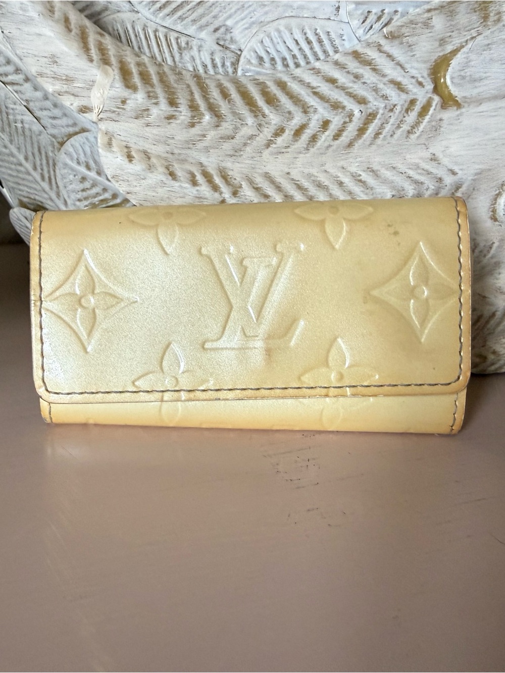Louis Vuitton Embossed Monogram Key Pouch in Pale Yellow